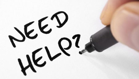 the inscription on the piece of paper is do you need help?